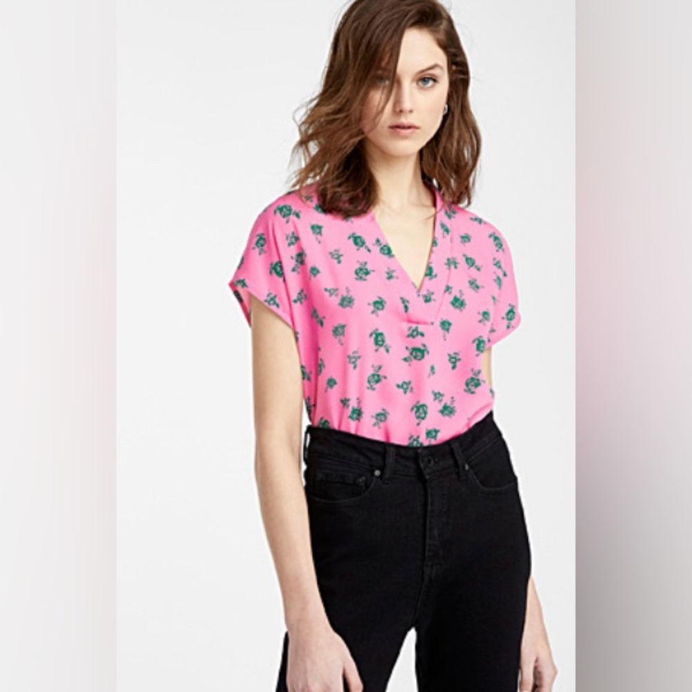 Pink blouse with flower